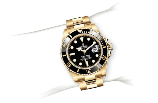 Rolex Submarine yellow gold and a black dial date